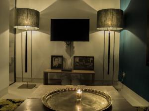 TV a/nebo společenská místnost v ubytování Douiria13