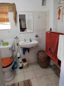 Ένα μπάνιο στο Serenity Guesthouse