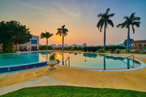 The swimming pool at or close to The Lalit Temple View