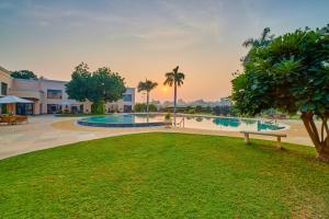 The swimming pool at or close to The Lalit Temple View