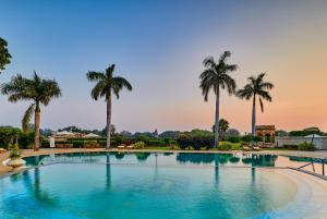 The swimming pool at or close to The Lalit Temple View