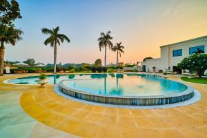 The swimming pool at or close to The Lalit Temple View