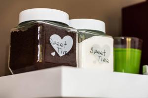 two jars of sweet time sitting on a shelf at OPG Dokić in Kopačevo