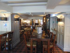 a dining room with a table and chairs at The Lord Nelson in Brigg