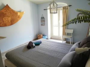 Posteľ alebo postele v izbe v ubytovaní Ca' Azzurra