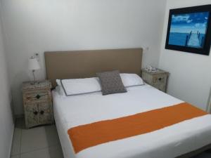 Postel nebo postele na pokoji v ubytování Suites Chapultepec