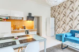 Kuchyňa alebo kuchynka v ubytovaní Apartament Miły