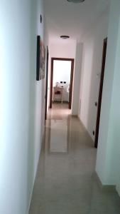 A bed or beds in a room at Alle Porte di Genova
