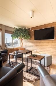 Televiisor ja/või meelelahutuskeskus majutusasutuses Best Western Hotel 23