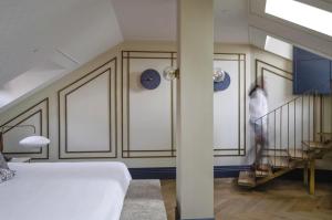 CoolRooms Palacio de Atocha房間的床