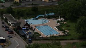 an overhead view of a swimming pool at a resort at Ferienwohnung Klaus in Treis-Karden