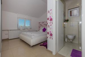 Koupelna v ubytování Villa Rossa Apartments