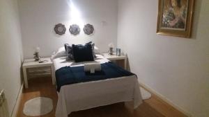 A bed or beds in a room at Casa de Huéspedes Prada