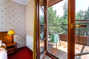 Balkón nebo terasa v ubytování Hotel - Dworek Tryumf
