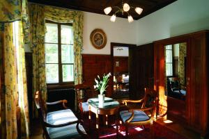 Ein Sitzbereich in der Unterkunft Villa Solitude