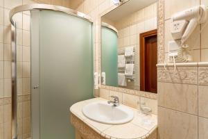 Koupelna v ubytování Hotel - Dworek Tryumf