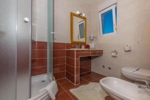 Kúpeľňa v ubytovaní Villa Marija Apartments