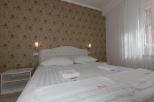 Posteľ alebo postele v izbe v ubytovaní Villa Marija Apartments