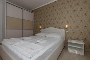 Posteľ alebo postele v izbe v ubytovaní Villa Marija Apartments