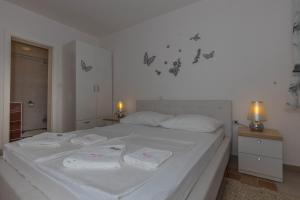 Posteľ alebo postele v izbe v ubytovaní Villa Marija Apartments