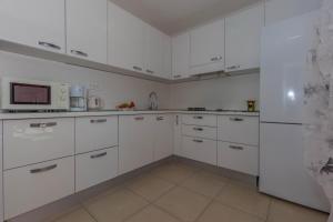 Kuchyňa alebo kuchynka v ubytovaní Villa Marija Apartments