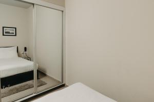 Ένα ή περισσότερα κρεβάτια σε δωμάτιο στο Hillel 11 Hotel