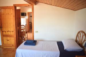 Postel nebo postele na pokoji v ubytování Bedda Casa Al Mare