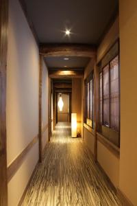 Postel nebo postele na pokoji v ubytování 都電屋 TodenHotel