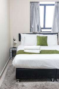 Ένα ή περισσότερα κρεβάτια σε δωμάτιο στο Hillel 11 Hotel