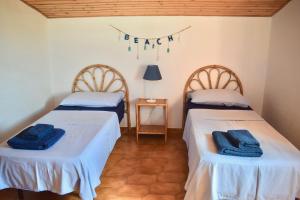 Postel nebo postele na pokoji v ubytování Bedda Casa Al Mare