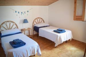 Postel nebo postele na pokoji v ubytování Bedda Casa Al Mare