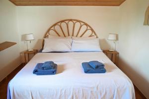 Postel nebo postele na pokoji v ubytování Bedda Casa Al Mare + 37 fotografií