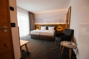 Postel nebo postele na pokoji v ubytování Hotel Tannenhaus