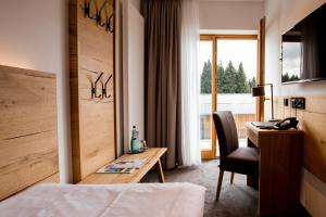 Postel nebo postele na pokoji v ubytování Hotel Tannenhaus