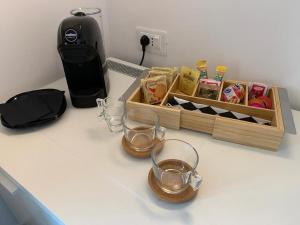 Príslušenstvo na prípravu kávy alebo čaju v ubytovaní B&B Adenzia