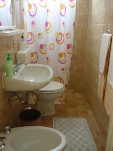 Koupelna v ubytování Hotel Milano