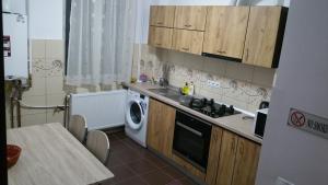 A cozinha ou cozinha compacta de Apartament Lavinia