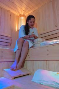 A bed or beds in a room at Hotel Paradis Suite Cusco