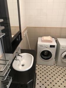 Koupelna v ubytování Allika Apartments