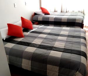 Postel nebo postele na pokoji v ubytování Real House Cusco