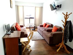 TV a/nebo společenská místnost v ubytování Real House Cusco