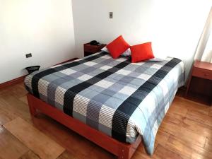 Postel nebo postele na pokoji v ubytování Real House Cusco