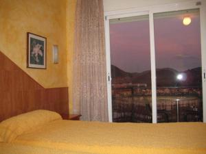 Postel nebo postele na pokoji v ubytování Hostal Sant Bernat