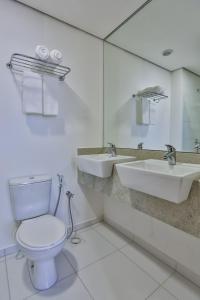 Phòng tắm tại Nobile Inn London Anápolis