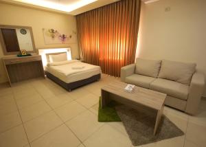 Postel nebo postele na pokoji v ubytování Lujain Hotel فندق النور واللجين
