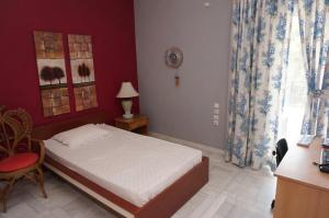 Postel nebo postele na pokoji v ubytování Sea Side Villa Alexandra