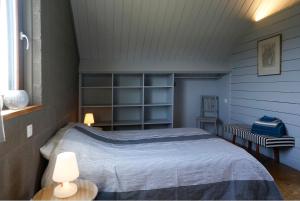 Ein Bett oder Betten in einem Zimmer der Unterkunft La Cassine de Patou