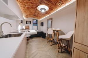 Posteľ alebo postele v izbe v ubytovaní M2 Main Square Studio