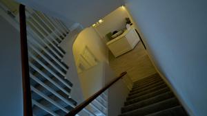an overhead view of a staircase in a house at Carmel House in Llandudno