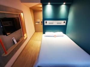 ibis budget Medellín Itagüí Metro客房内的一张或多张床位
